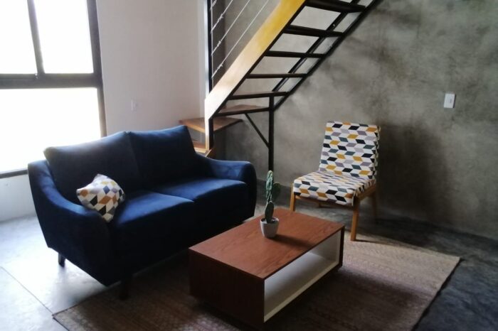 Sala de estar con ambiente relajante en alojamiento boutique Caribe